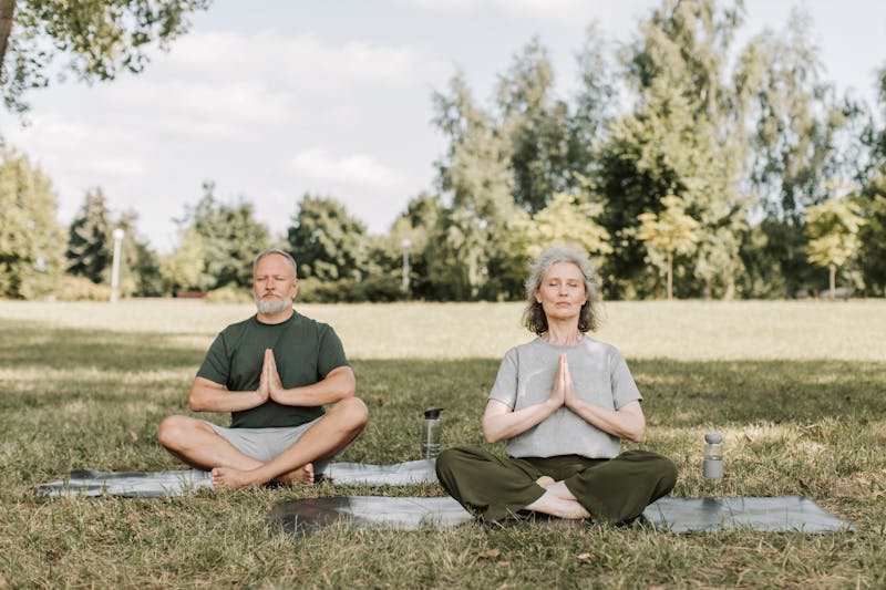 Senior woman practicing yoga meditation